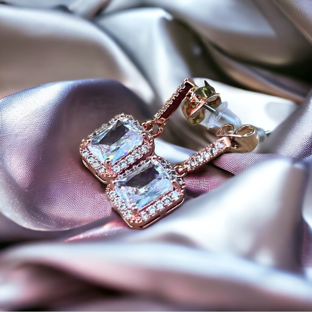 Cubic zirconia rose gold colored fashion jewelry earrings. Simple square dangle